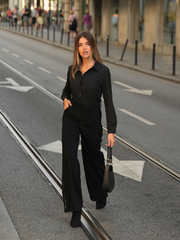 Calças pretas com lantejoulas laterais