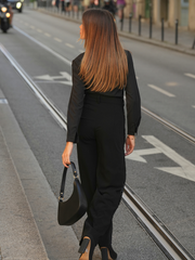 Calças pretas com lantejoulas laterais